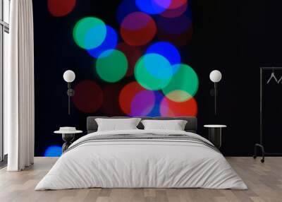 Multi-color blue holiday garland. Garland is blurred. Many big colorful round lights. Fully defocused photo. Blurred background and foreground. Holiday mood. New Year and Christmas is coming. Wall mural