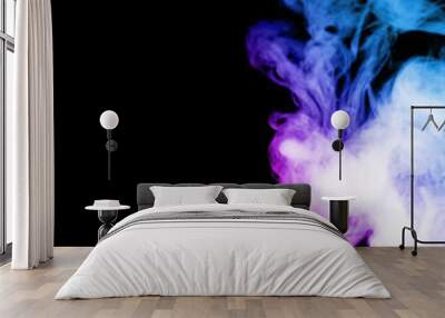 Vape clouds splash with two colours fog is blue and purple colour. Low light photo. Stock isolated on black background color smoke with spray boiling glycerine lines. Wall mural