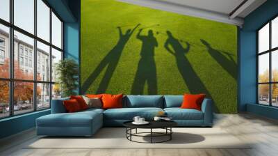 four golfers with open hands silhouette on grass Wall mural