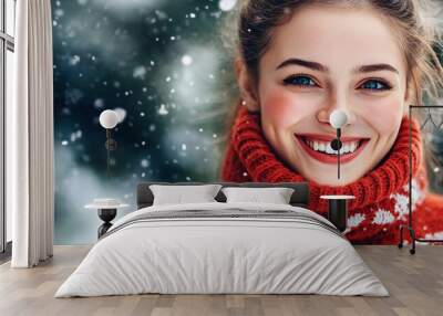 Beautiful woman smiling with snow falling in winter forest Wall mural