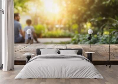 Empty wooden surface with blurred father and son in park background Wall mural