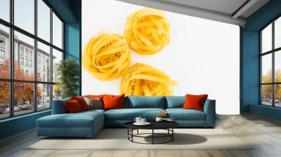 Italian egg pasta nest isolated on white background Wall mural