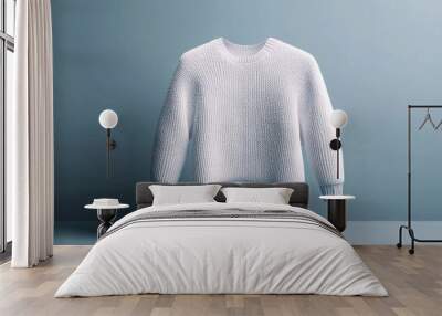 White woolen sweater floating on minimalist blue background Wall mural