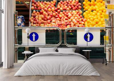 supermarket entrance with background of fruits baskets Wall mural