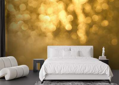 Golden bokeh background close up. Abstract blurred glowing background. Wall mural