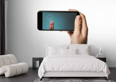 Hand holding smartphone, blank screen on white background Wall mural