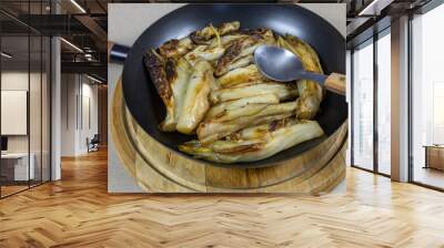 braised endives in a frying pan Wall mural