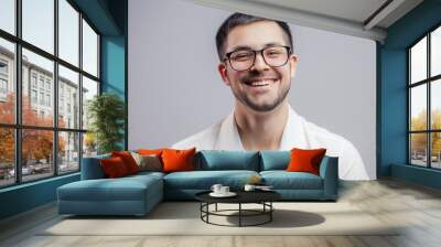 carefree positive male in glasses. cheerful man rejoicing at the good business news Wall mural