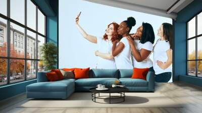 friendship, fashion, body positive, diverse female beauty concept - group of happy multicultural different size women in casual wear making selfie on white background Wall mural