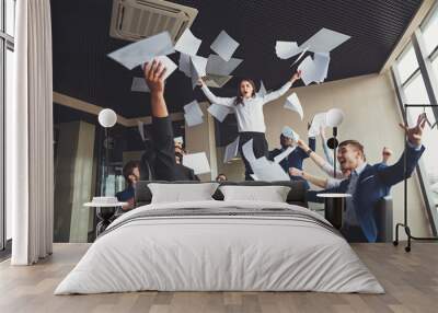 Group of business people supporting dancing female colleague Wall mural