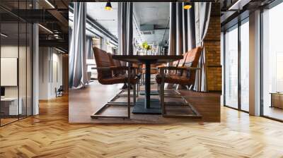 interior loft style restaurant with leather chairs Wall mural