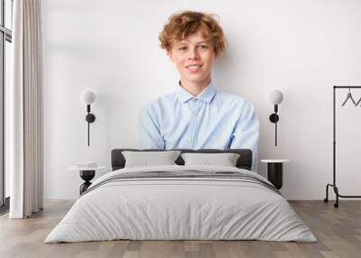 portrait of smiling young boy 14 years old isolated over white background, look at camera. youth concept Wall mural