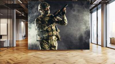 security, soldiers, military forces, defense concept. young russian soldier aiming his gun weapon at enemy, against war Wall mural