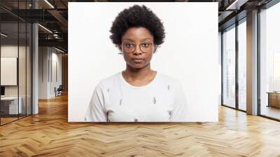 serious, strict african teacher with short curly hair. isolated white background. copy space. education, fashion concept Wall mural