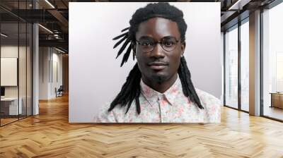 young handsome afro american man with dreadlocks isolated on white background Wall mural