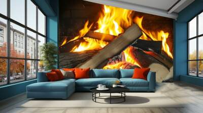 Logs burning brightly in a fireplace Wall mural