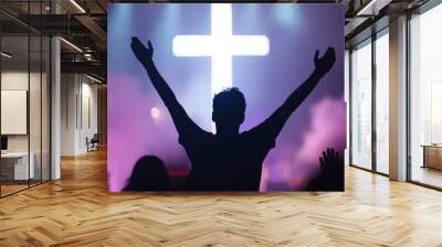 Silhouette of a Man Praying Before a Cross in a Church Wall mural