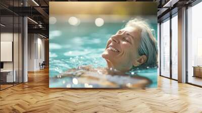 Smiling Woman Relaxing in a Swimming Pool Wall mural