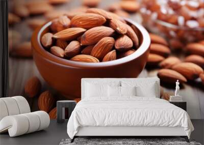 almonds in a bowl showcasing vitamin e for skin Wall mural