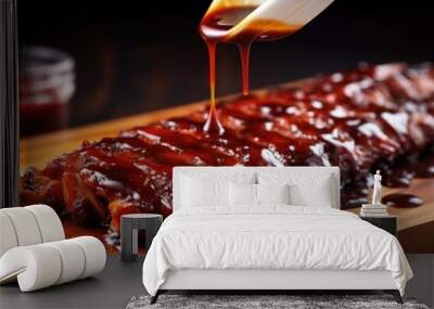 close-up of juicy ribs with brush applying bbq sauce Wall mural