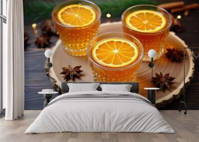 clove-studded orange slices floating on a glass of mulled cider Wall mural