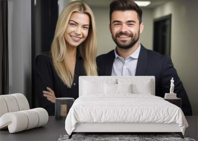 portrait of two smiling coworkers standing in the office Wall mural