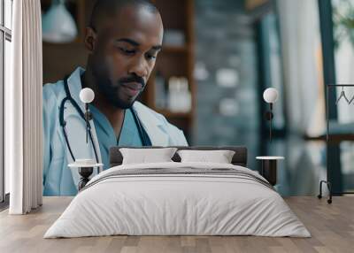 A doctor is looking at a tablet while wearing a white coat Wall mural