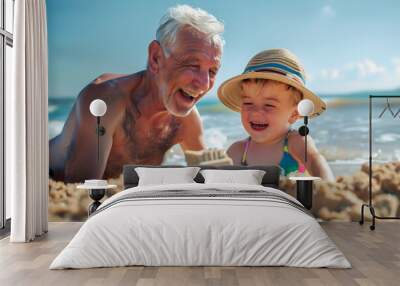 Grandfather and grandchildren enjoying summer day building sandcastle on the beach Wall mural