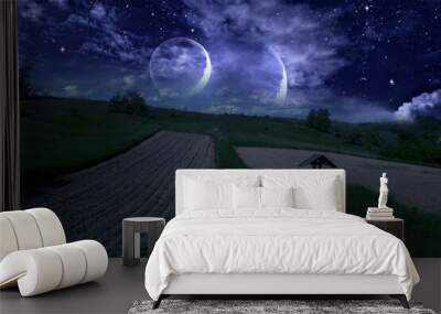 Fabulous night sky and two moons, rural landscape Wall mural