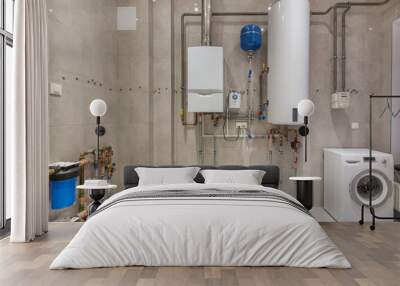 Wall hung gas boiler and electric water heater in boiler room Wall mural