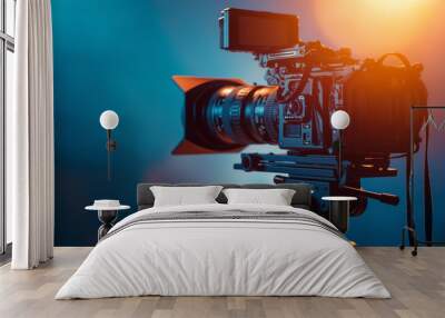 professional filmmaking camera on tripod stand, videography or filmmaking business  Wall mural