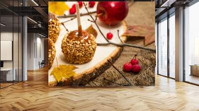 Caramel Apples on Wooden Background. Selective focus. Wall mural