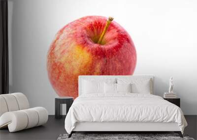 Shot from above of a ripe red juicy macintosh apple with a stem on a bright background Wall mural