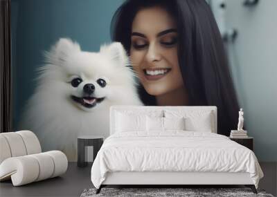 Trustworthy vet holding a joyful white Pomeranian Wall mural