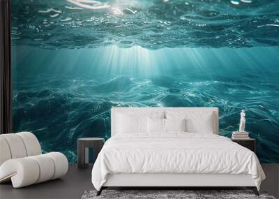 Underwater View of Sunbeams Illuminating Rippling Ocean Water Wall mural