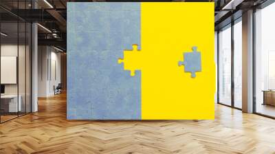 Abstract background of many puzzles on an yellow background. The concept of teamwork. Wall mural