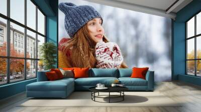 Winter young woman portrait. Beauty Joyful Model Girl laughing and having fun in winter park. Beautiful young female outdoors, Enjoying nature, wintertime Wall mural