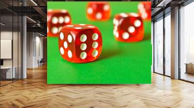 Dice on a green background . Game concept. Games of chance Wall mural