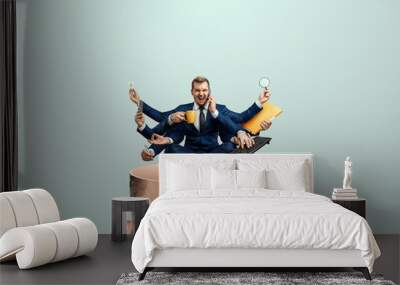 Instead of a brain, a man has a multi-armed businessman in his head. Creative picture, concept of multitasking, multi-hands, brain work, stress resistance. Wall mural