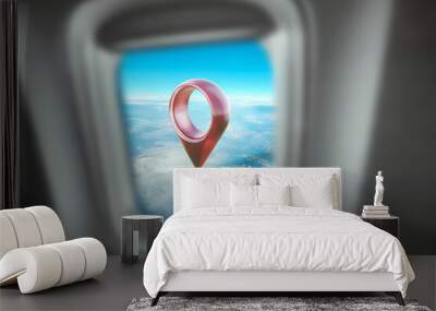 Red position pin in the window of the plane. Concept, delivery service, courier service, fast delivery. copy space. Wall mural