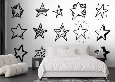 Hand Drawn stars doodles set. Sketch style icons. Decoration element. Isolated on white background. Flat design. Vector illustration Wall mural