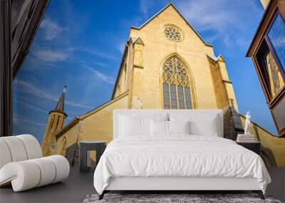 St. Remigius catholic parish church gothic style building in Bonn historical city centre, blue sky background, North Rhine-Westphalia region, Germany Wall mural