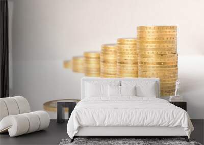 Stacks of coins on a light background. Business concept and growth of capital. Wall mural