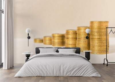 Stacks of coins on a light background. Business concept and growth of capital. Wall mural