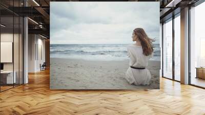 beautiful alone girl on the beach Wall mural