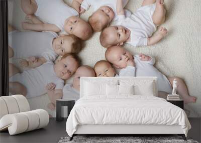 cute babies on light background Wall mural