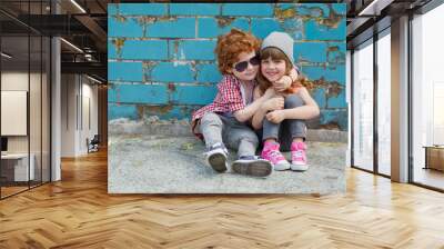 photo of two cute hipsters Wall mural