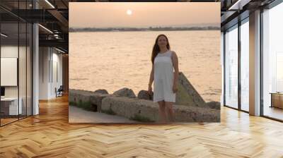 young girl in a white dress Wall mural