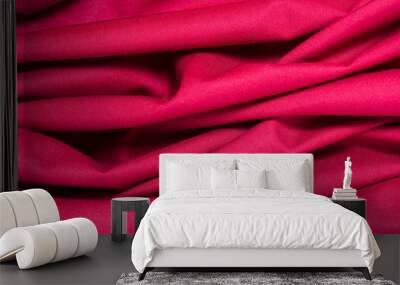 texture of red cotton fabric with arbitrary bends and wave, abstract background Wall mural