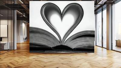   A black-and-white image shows a book with a heart-shaped cutout in its pages, resembling a book Wall mural